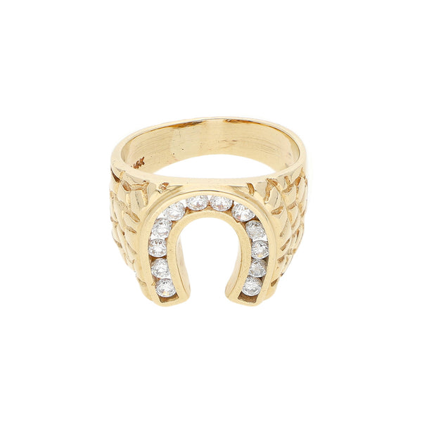 Anillo barroco con circonias motivo herradura en oro amarillo 14 kilates.