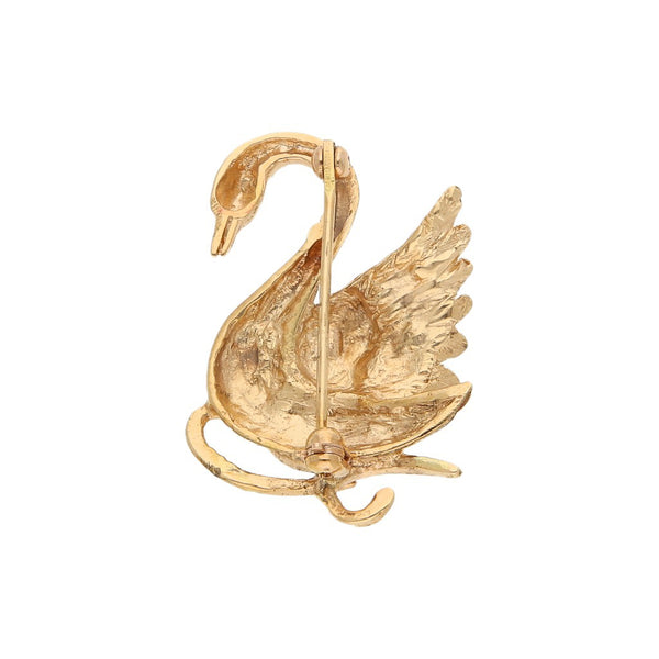 Prendedor labrado motivo cisne en oro amarillo 14 kilates.