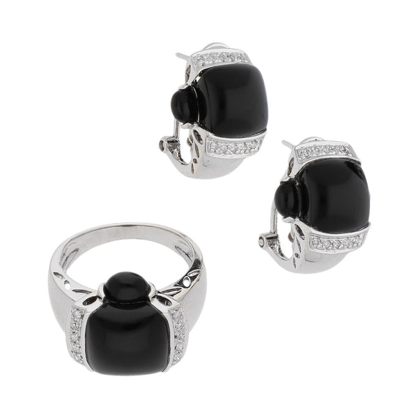 Juego de anillo y aretes diseño especial con diamantes y ónix en oro blanco 14 kilates.