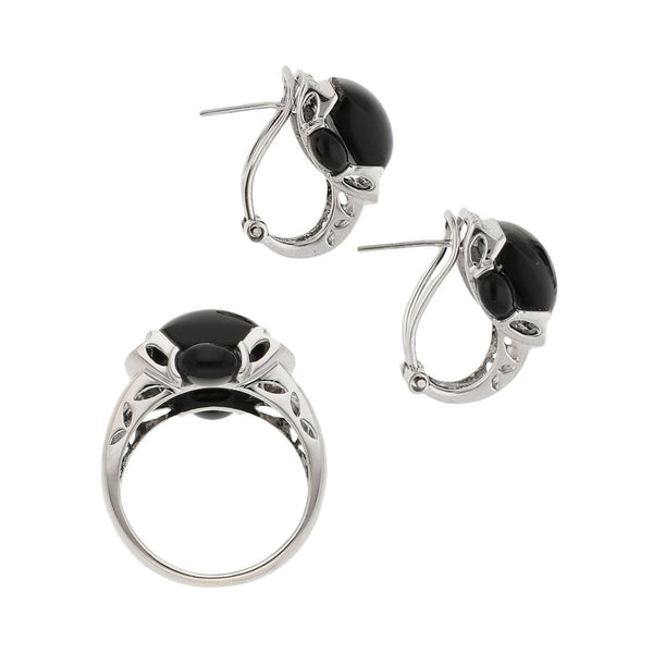 Juego de anillo y aretes diseño especial con diamantes y ónix en oro blanco 14 kilates.