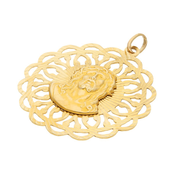 Medalla doble imagen motivo Virgen y Cristo en oro amarillo 14 kilates.