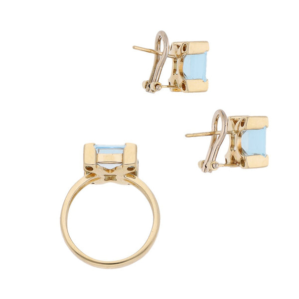 Juego de anillo y aretes diseño especial con sintéticos en oro amarillo 14 kilates.