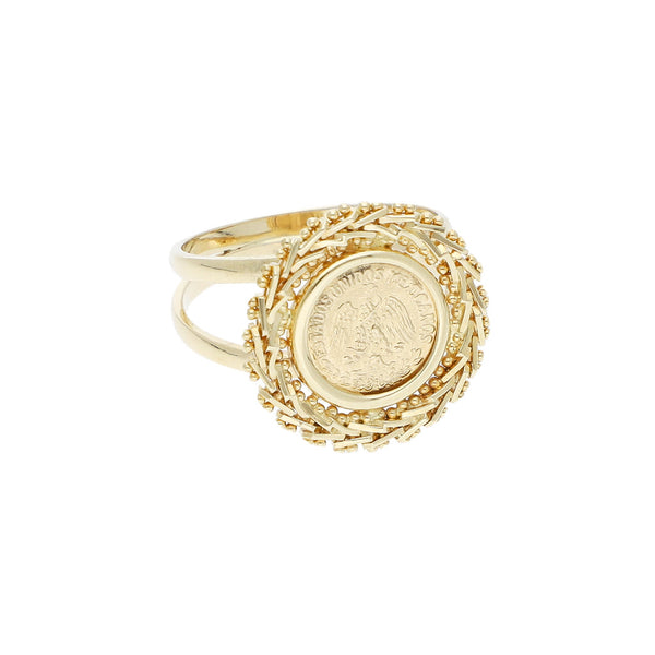 Anillo boleado con aplicación motivo moneda en oro amarillo 14 kilates.