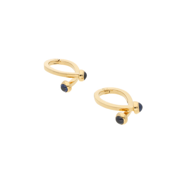 Mancuernillas diseño especial con zafiros firma Tane en oro amarillo 18 kilates.