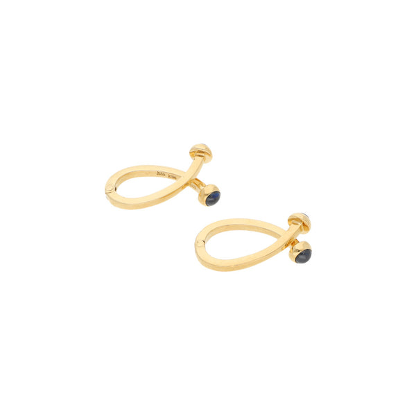 Mancuernillas diseño especial con zafiros firma Tane en oro amarillo 18 kilates.