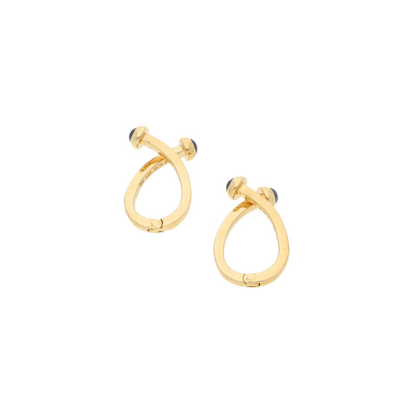 Mancuernillas diseño especial con zafiros firma Tane en oro amarillo 18 kilates.