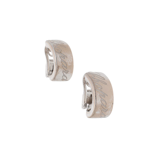 Aretes diseño especial firma Chopard en oro blanco 18 kilates.