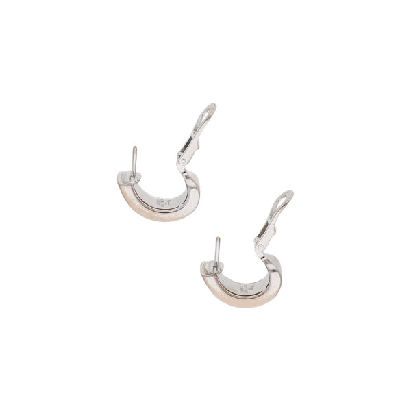 Aretes diseño especial firma Chopard en oro blanco 18 kilates.