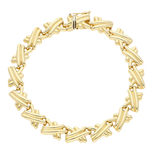 Pulsera eslabón articulado en oro amarillo 14 kilates.