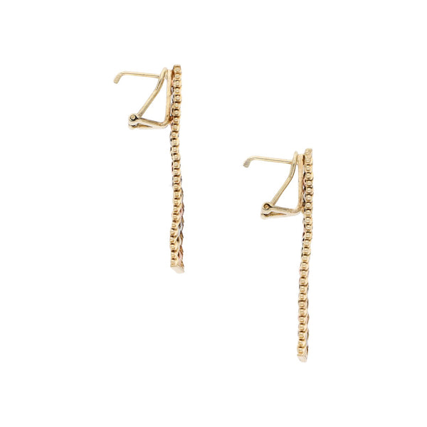 Aretes diseño especial en oro tres tonos 14 kilates.
