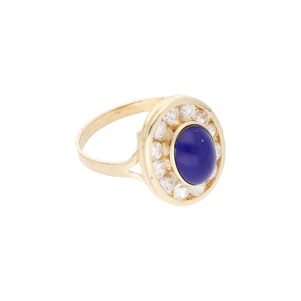 Anillo diseño especial con sintéticos en oro amarillo 14 kilates.