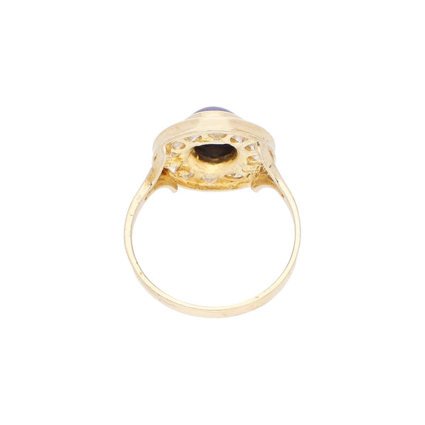 Anillo diseño especial con sintéticos en oro amarillo 14 kilates.