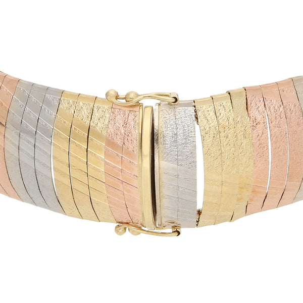 Pulsera eslabón panza de víbora en oro tres tonos 14 kilates.