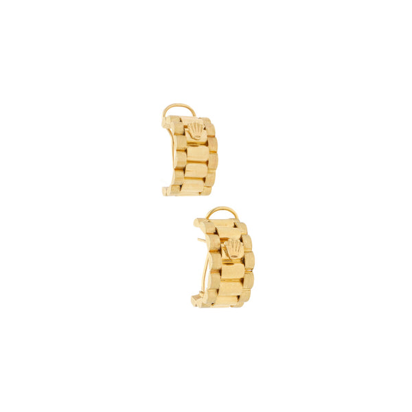 Aretes diseño especial en oro amarillo 14 kilates.