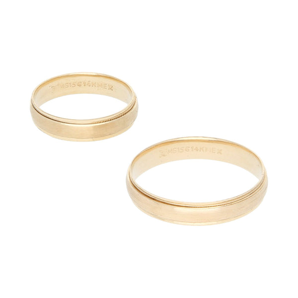Dos argollas lisas en oro amarillo 14 kilates.