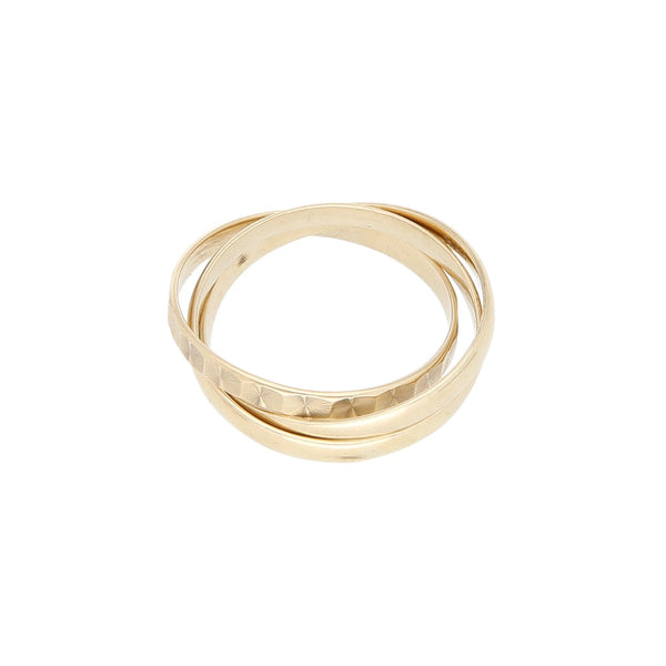 Alianza de tres piezas diseño especial en oro amarillo 12 kilates.
