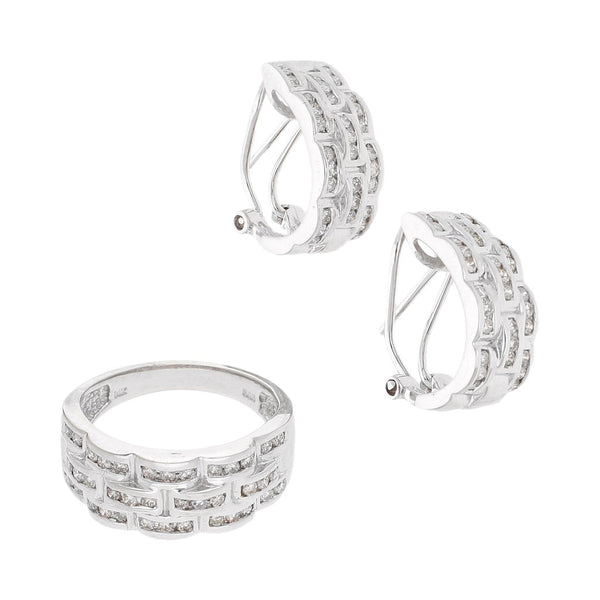 Juego de anillo y aretes diseño especial con diamantes en oro blanco 14 kilates.