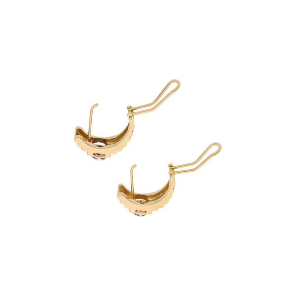 Aretes diseño especial con diamantes en oro amarillo 18 kilates.
