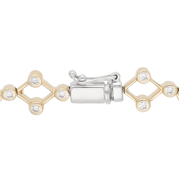 Pulsera eslabón articulado con sintéticos en oro amarillo 14 kilates.