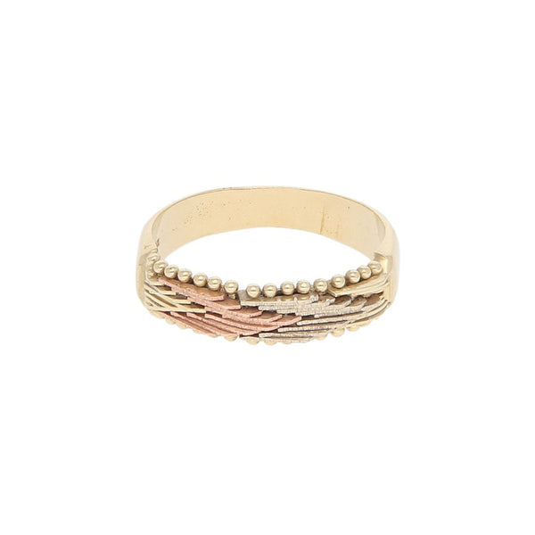 Anillo boleado en oro tres tonos 14 kilates.