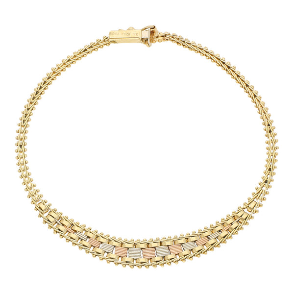 Pulsera eslabón boleado en oro tres tonos 14 kilates.