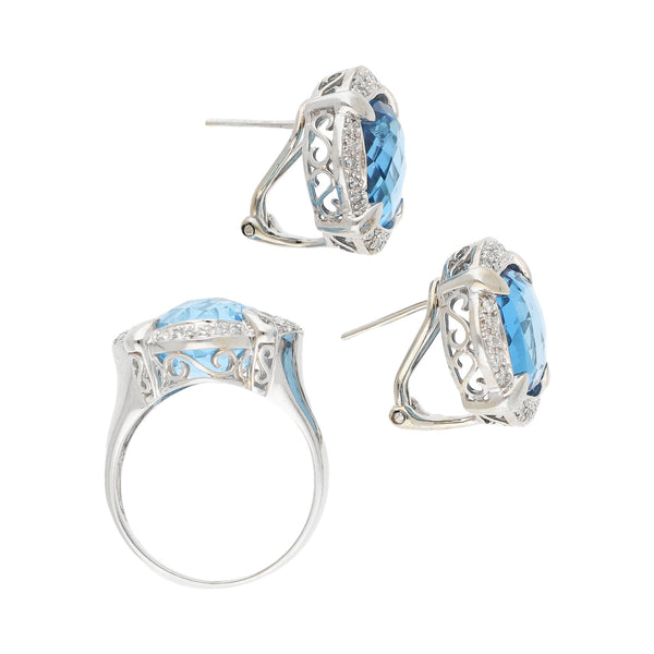 Juego de anillo y aretes diseño especial con diamantes y sintéticos en oro blanco 14 kilates.