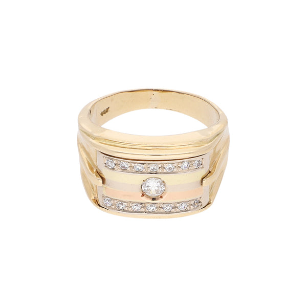 Anillo tipo con sintéticos en oro tres tonos 14 kilates.
