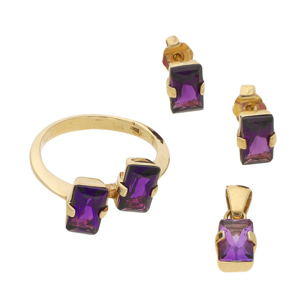Juego de anillo, broqueles y dije diseño especial con sintéticos en oro amarillo 14 kilates.