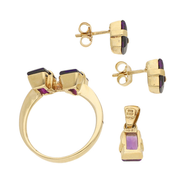 Juego de anillo, broqueles y dije diseño especial con sintéticos en oro amarillo 14 kilates.