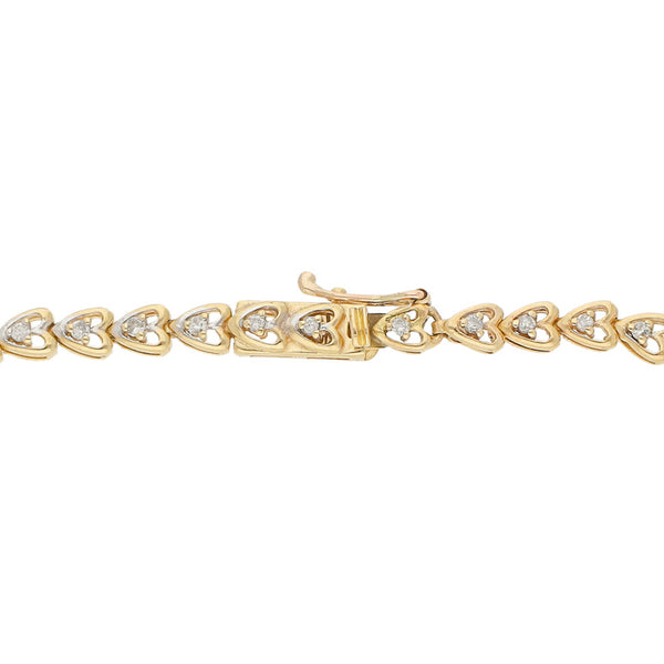Pulsera eslabón articulado en oro tres tonos 14 kilates.