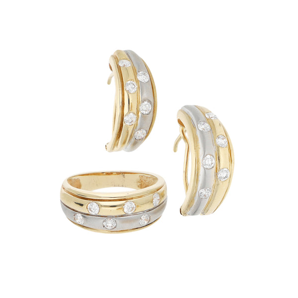 Juego de anillo y aretes diseño especial con circonias en oro amarillo 14 kilates.