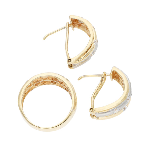 Juego de anillo y aretes diseño especial con circonias en oro amarillo 14 kilates.