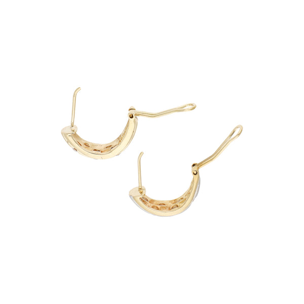 Juego de anillo y aretes diseño especial con circonias en oro amarillo 14 kilates.