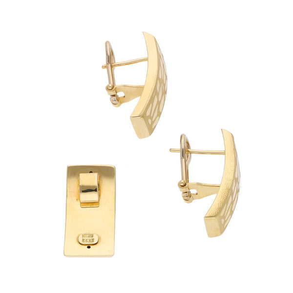 Juego de aretes y dije diseño especial en oro amarillo 14 kilates.