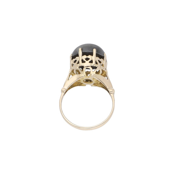 Anillo diseño especial con sintético en oro amarillo 12 kilates.