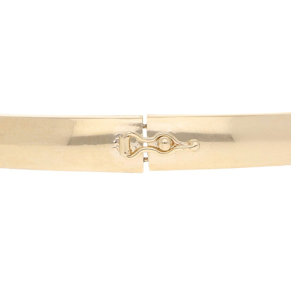 Pulsera de arillo labrada en oro tres tonos 14 kilates.