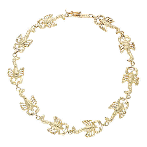 Pulsera eslabón articulado motivo escorpiones en oro amarillo 14 kilates.