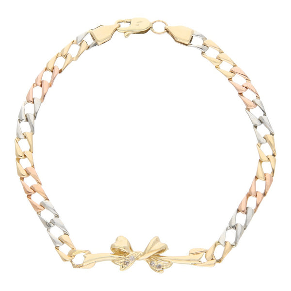 Pulsera eslabón encontrado con aplicación motivo moño con circonias en oro tres tonos 14 kilates.