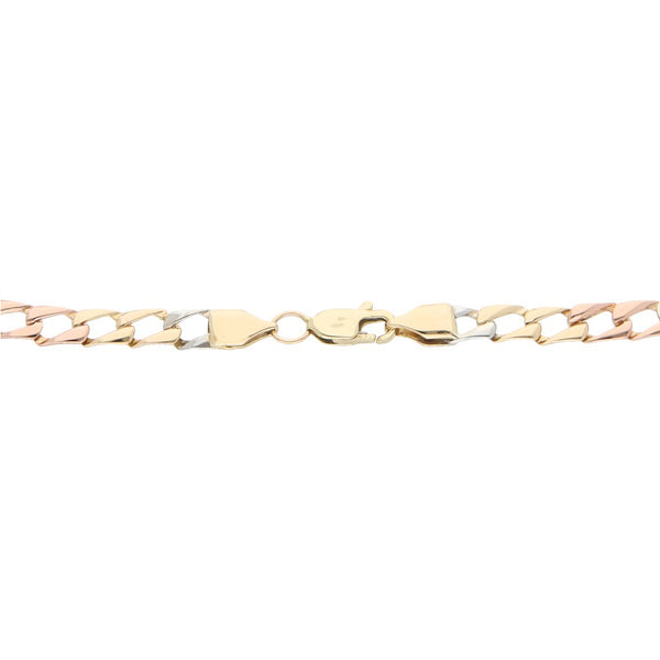 Pulsera eslabón encontrado con aplicación motivo moño con circonias en oro tres tonos 14 kilates.