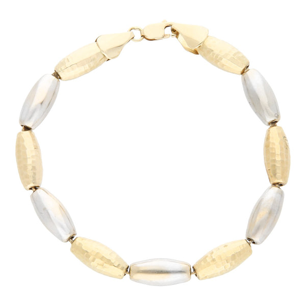 Pulsera eslabón hueco en oro dos tonos 14 kilates.