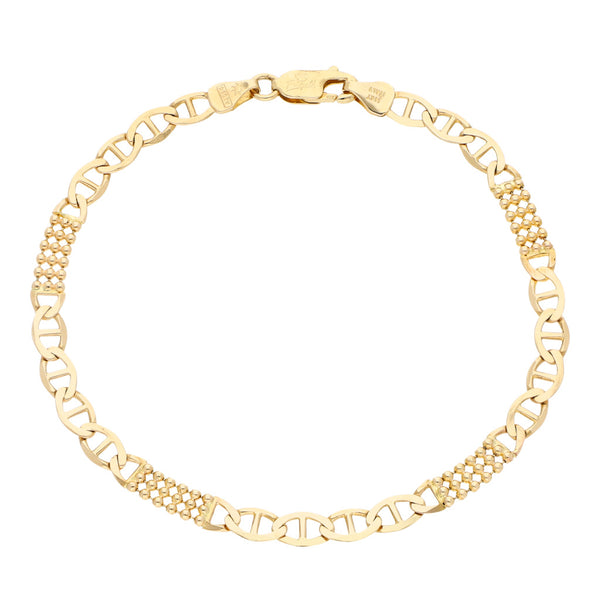 Pulsera eslabón combinado en oro amarillo 14 kilates.