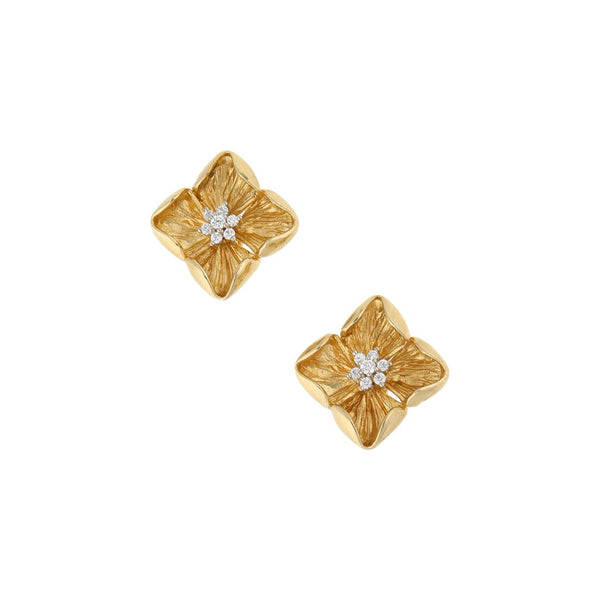 Aretes diseño especial con sintéticos motivo flor en oro amarillo 14 kilates.
