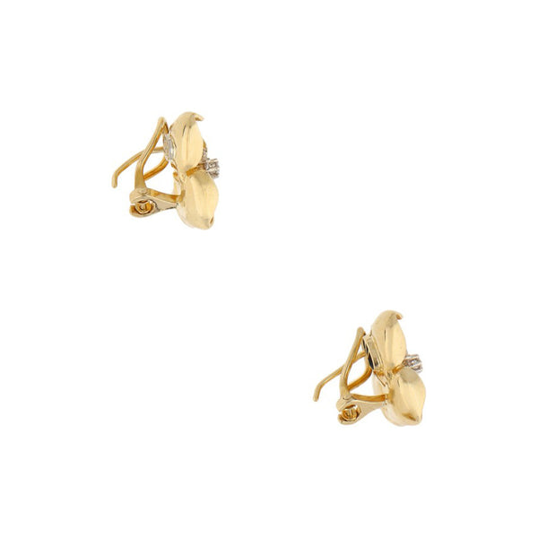 Aretes diseño especial con sintéticos motivo flor en oro amarillo 14 kilates.