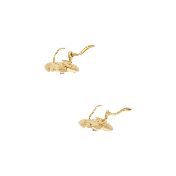 Aretes diseño especial con sintéticos motivo flor en oro amarillo 14 kilates.