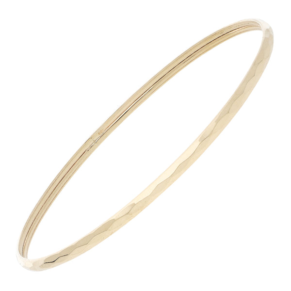 Pulsera de arillo facetada en oro amarillo 12 kilates.