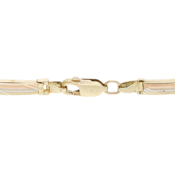Pulsera eslabón articulado en oro amarillo 14 kilates.