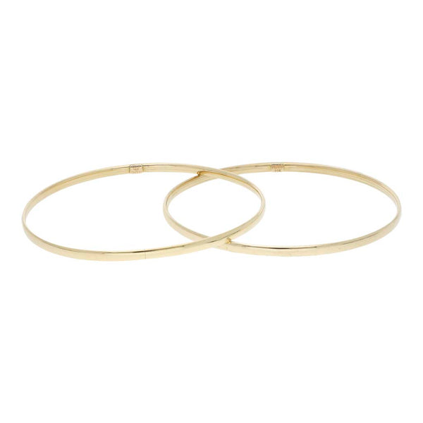 Dos pulseras de arillo laminadas en oro amarillo 14 kilates.