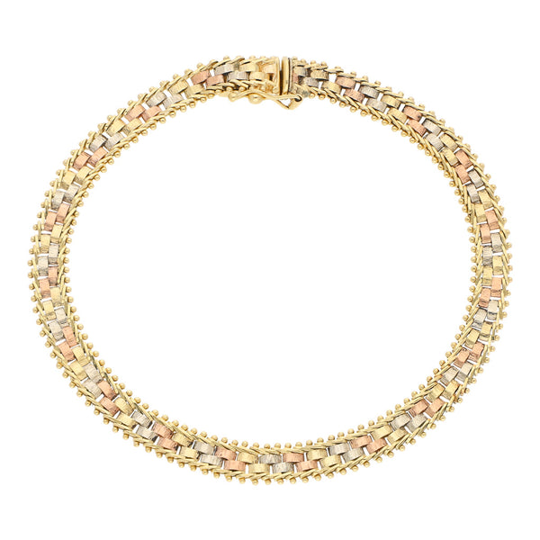 Pulsera eslabón boleado en oro tres tonos 14 kilates.