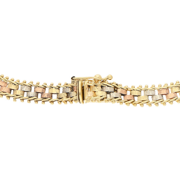 Pulsera eslabón boleado en oro tres tonos 14 kilates.