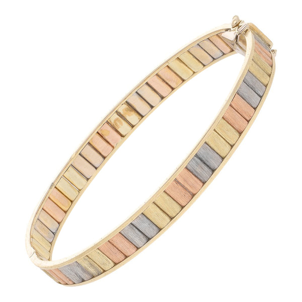 Pulsera de arillo articulada en oro tres tonos 14 kilates.
